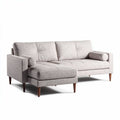 Divano angolare in tessuto grigio chiaro con pouf e braccioli 200 x 85 x 85cm